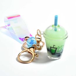 Cute Mini Bottle Keychain Diy Milk Tea Keyring Moving Liquid Bag Charm Jewelry Accessories Women Luxury Cool Gift Wholesale G1019