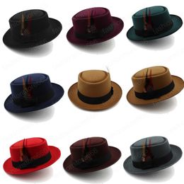 Autumn winter Women Wide Brim Hats with Feather flat top Panama Felt Fedoras Hat for Men wool Jazz Cap British style