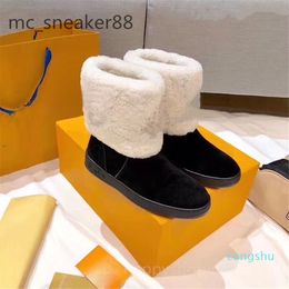 2021 designers snow boots women fashion soft leather flat girls casual winter brown shoe with fur half boot11
