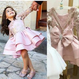 2021 Pink Flower Girls Dresses For Weddings Jewel Neck Long Sleeves Sequined Lace Appliques Bow Knee length Tiered Short Birthday Children Girl Pageant Gowns