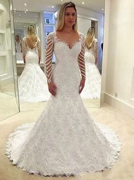 Gorgeous Lace Mermaid Wedding Dresses Long Sleeve Sequins Beads Beaded Appliques Bridal Gowns Sexy Backless Chapel Garden Bride Dress