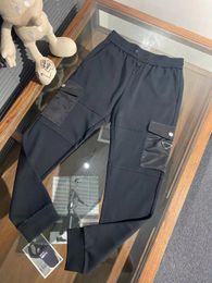 Autumn and winter new men's designer cargo pants Multi Pocket stitching comfortable material elastic waist small feet black mens pants