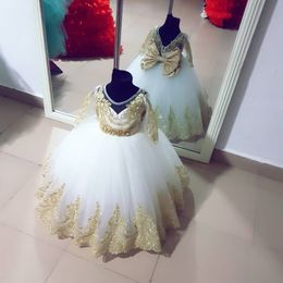 cupcake applique Australia - 2022 Modern Gold Lace White Cupcake Flower Girls Dresses For Wedding Long Sleeves Beads Sequin Tulle Big Bows Applique First Communion Dress
