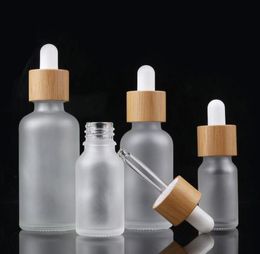 5ml 10ml 15ml 20ml 30ml 50ml Essential Oil Dropper Bottle with bamboo essence in frosted glass 1000pcs wholesale SN3070