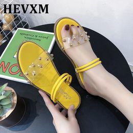 summer new net red fashion wild rhinestone sandals and slippers women transparent word with flat bottom two wear sandals women