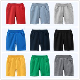 男の子の女の子ショートパンツ1-9t子供のためのズボン100％コットンスポーツカジュアルニッカーズ夏の子供ブティック服緑の灰色の赤いネイビーブルーイエロー9固体色
