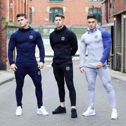 Uomo Running Sets Uomo Tute sportive Felpe con cappuccio Pantaloni Set Felpa Pantaloni sportivi Abbigliamento sportivo Palestra Fitness Tuta Maschile Casual Jogging Y1221