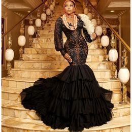 Black Mermaid Prom Dresses Lace Long Sleeve Sexy Hollow Neck Ruffles Tiered Skirt Evening Dress Formal Occasion Party Gowns 2021
