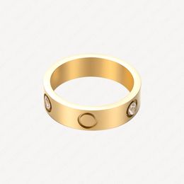 5mm 6mm Stainless steel 18K Gold Plated love ring men and women lovers couple Diamond rings gift size 7-9 Classic fashion Accessories With Jewellery Pouches Wholesale