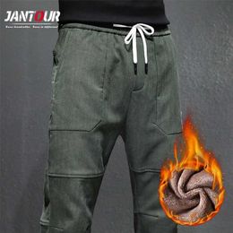 Pantaloni invernali da uomo di marca Pantaloni cargo caldi spessi Pantaloni casual in pile Tasche Pantaloni Moda ArmyGreen Allentato Baggy Joger Maschio 211201