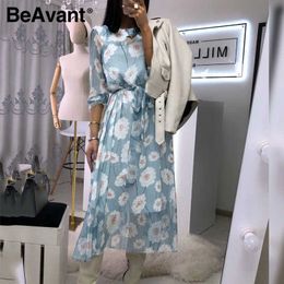 BeAvant Casual flare sleeve dress women Office ladies high waist belt long dress Elegant floral printed blue summer dresses 210709