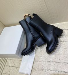 Direct selling high-quality women's boots fashion soft slide PVC zipper bare boot thick heel 6cm show party rain shoes luxury box 35-40