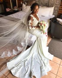2021 Long Sleeves Wedding Dresses Luxury Beaded Pealrs Lace Applique Scoop Neck Illusion Sweep Train Plus Size Wedding Gown vestid257n