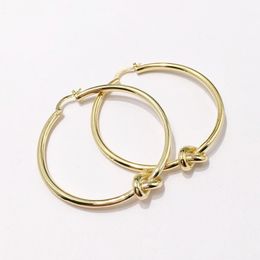 2021 good ear rings womens charm designer jewelry gold earrings studs hypoallergenic tie a knot copper electroplating fashion party women cuff dangle earring