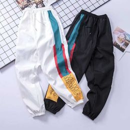 2021 Men Sweatpants Loose Men Joggers Pants Hip Hop Sportswear Track Harem Unisex Streetwear Pant Side Stripe Track Jogger Y0927