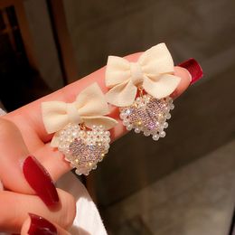 New Trendy Classic Heart Imitate Zircon Pearl Charm Women Stud Ear Sweet And Lovely Bow Tie White Love Earrings Fashion Jewellery Lady Accessories 2021 AFSHOR