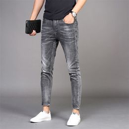 Wholesale Denim jeans men's trendy brand Slim feet casual long pants Korean style summer thin smoke Grey pencil 211111