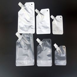 50ml 100ml 250ml 500ml Empty Stand up Plastic Drink Spout Bag transparent and foil Self-standing suction bags