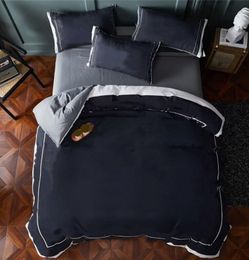 新しい綿の寝具セットクイーンサイズの文字ジャックヤードキルトカバーセット2枕ケースの寝具シート布団カバーを含む