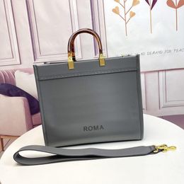 -Großhandel Designer Tote Bag Luxurys Designer Handtaschen Leder Crossbody Umhängetaschen Große Kapazität Handtasche Metall Brief Strap Roma Sunshine First Clip Pack