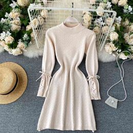 Bandage long sleeve knitted dress women's autumn winter temperament stand collar slim short sweater 210603