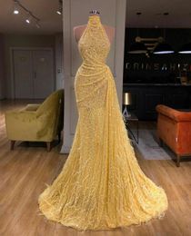 2021 Glitter Sequined Lace Feather Sexy Yellow Mermaid Prom Dresses Halter Sleeveless Sequins Illusion Plus Size Formal Party Evening Gowns Sweep Train