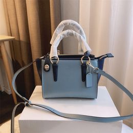 Classic luxury design leather Bat Bag fashion Colour matching simple lady's handbag Harmonious Colour high quality wing bag