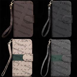 Top Designers Leather Phone Cases For iPhone 13 Pro Max 12 Mini 11 Xs XR X 8 7 Plus Fashion Wristband Lanyard Designer Print Back Cover Luxury Shell Wallet Flip Case