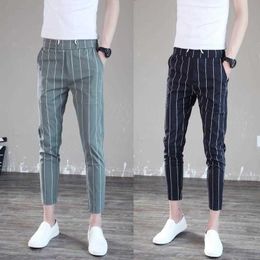 Социальный дух парня повседневные брюки мужские корейские тонкие брюки моды Trend вертикальные полосы брюки лето X0723