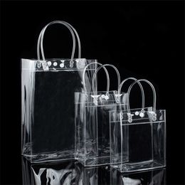 -10 unids PVC plástico bolsas de regalo con asas de plástico bolsas de embalaje de vino transparente bolso de mano Favores de favores de la moda PP con botón 9 V2