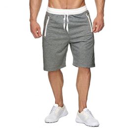 Pantaloncini da uomo stile popolare primavera ed estate alla moda Pantaloni da spiaggia casual con coulisse in cotone di grandi dimensioni Pantaloncini sportivi da 5 centesimi