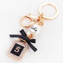 Brand Perfume Bottle Keychain Luxury Key Chain Fashion Key Ring Holder Keyrings Women Souvenirs Car Bag Charm Pendant G1019