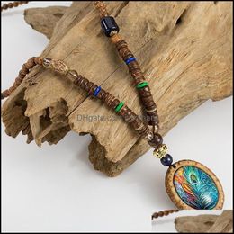 Pendant Necklaces & Pendants Fashion Peacock Feather Ethnic Nepal Handmade Sandalwood Beads Long Sweater Necklace Vintage Jewelry Drop Deliv