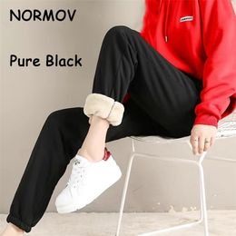 NORMOV Women's Winter Leggings Cold-Resistant Solid Colour Leggings Stretchy Comfortable Keep Warm And Fleece Leggings Warm Pants 211216