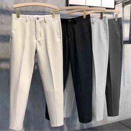 2022 New Men Casual Pants Spring Summer Little Feet Slim Fit Party Work Pants Streetwear Fashion Social Nine-point Trouser 27-36 Y220308