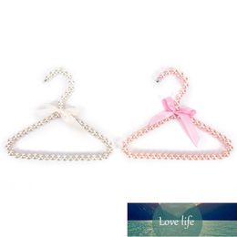 Fashion Plastic Pearl Bow Clothes Clothing Hanger For Kids Children Pet Dog Cat Factory price expert design Quality Latest Style Original Status