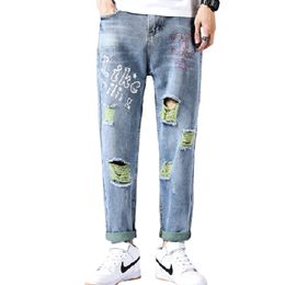 High-Quality Spring Mens Personality Printed Ripped Jeans Casual Korean Version Of Rhinestone Straight Cropped Trousers sizes 42
