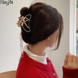 HangZhi 2021 Fairy Hollow Butterfly Flower Handmade Pearl Chain Long Tassel Hair Claw Side Clamp For Women Accessories Clips & Barrettes