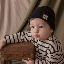 Korean smiling face children's hat Warm caps for boys and girls baby hats