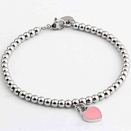 -Chaîne de vente à chaud ti ff 2022 Femmes perles de pêche bracelet coeur femelle en acier inoxydable en forme de voix rouge d'amour