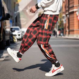 2021 Men Women Korean Black Plaid Casual Pants Mens Streetwear Harem Pants Male Chequered Trousers Plus Size XXXL X0723