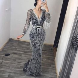 Full Sequined Reflective Mermaid Blue Prom Dresses Deep V Neck Long Sleeves Evening Gowns With Tassels Sweep Train Formal Party Dress