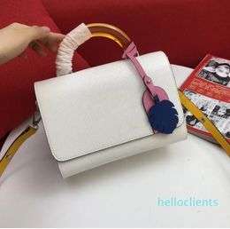 New Arrivals high quality mid-size handbag Shoulder Bags Glass handle and colorful brand pendant Removable leather strap size23*17*9.5