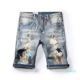 2021 Pantaloni da uomo Scarpe pantaloncini Jean Alberi di cocco graffiti capris strappati shkinny Jeans Designer Uomo S Abbigliamento