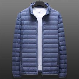 Winter Stand Collar Men's Ultra Light Down Jacket Big Size 7XL 8XL Padded 90% White Duck Down Warm Coats Zip Pockets 211129