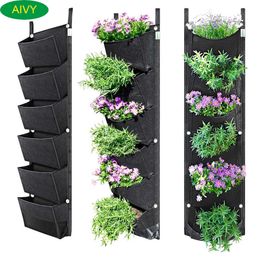 AIVY 1Pc107x30cm 6 Pockets Vertical Garden Planter Wall-Mounted Planting Flower Grow Bag Garden Courtyard Office Home Decoration 210615