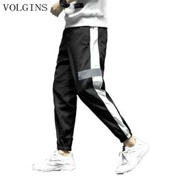 Streetwear 2020 New Reflective Pants Men Hip Hop Sweatpant Mens Casual Track Harem Pants Homme Jogger Trousers Y0927