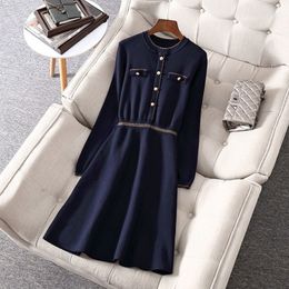 Plus Size Dress Women Autumn Winter Fashion Knitted Metal Button O Neck Midi Dress Elegant Hit Color Sweater Dresses M- 210320