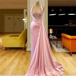 Charming Pink Sexy Mermaid Prom Dresses Long Deep V Neck Beaded Sequined Floor Length Stain Formal Evening Party Wear With Train Custom Made