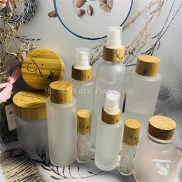 Eco-friendly wooden lid bamboo cap frosted transparent matte plastic bottles and jars skin care cream jar bulk wholesalegoods